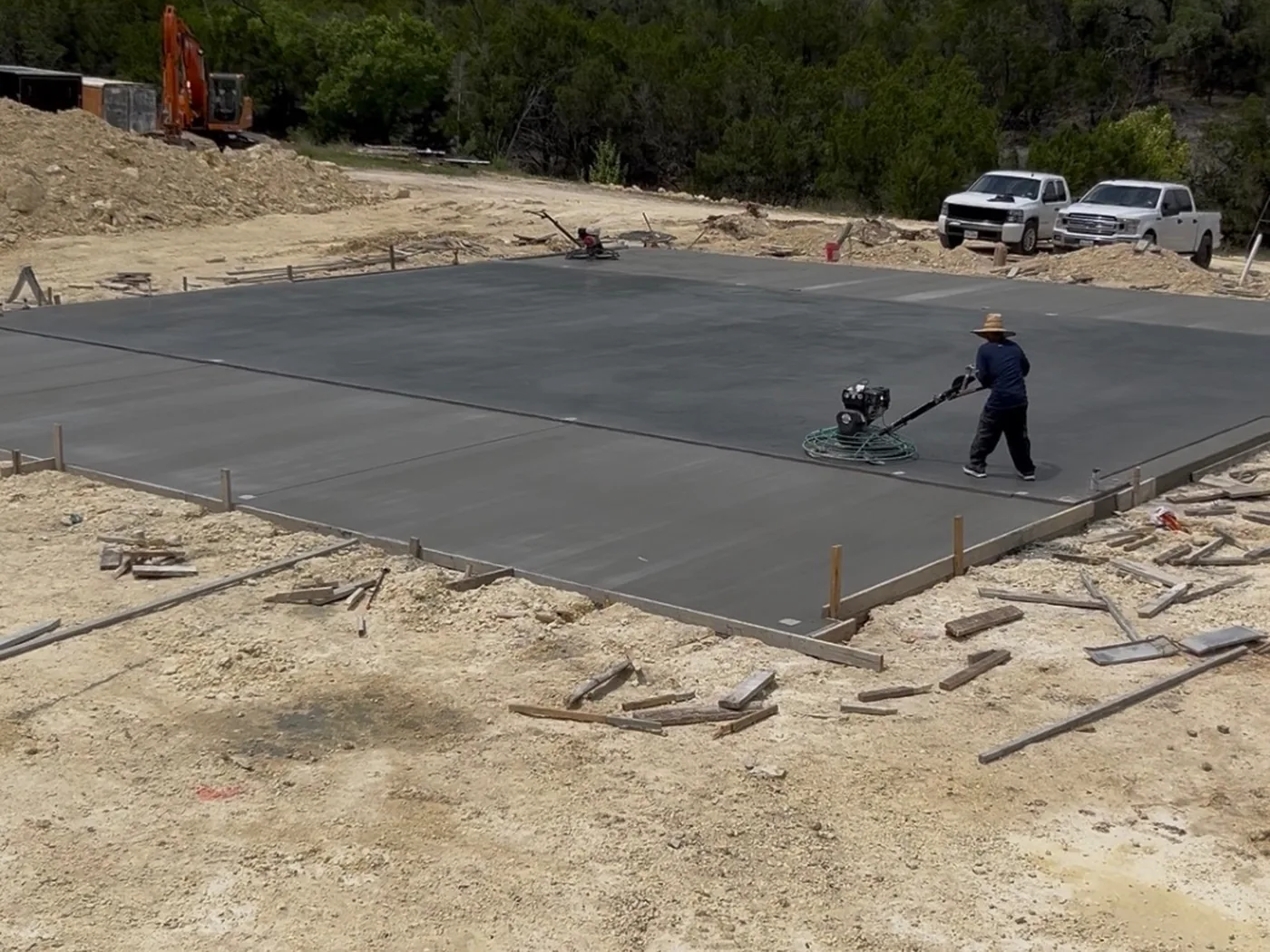 Finished power-troweled shop foundation slab in the Texas Hill Country